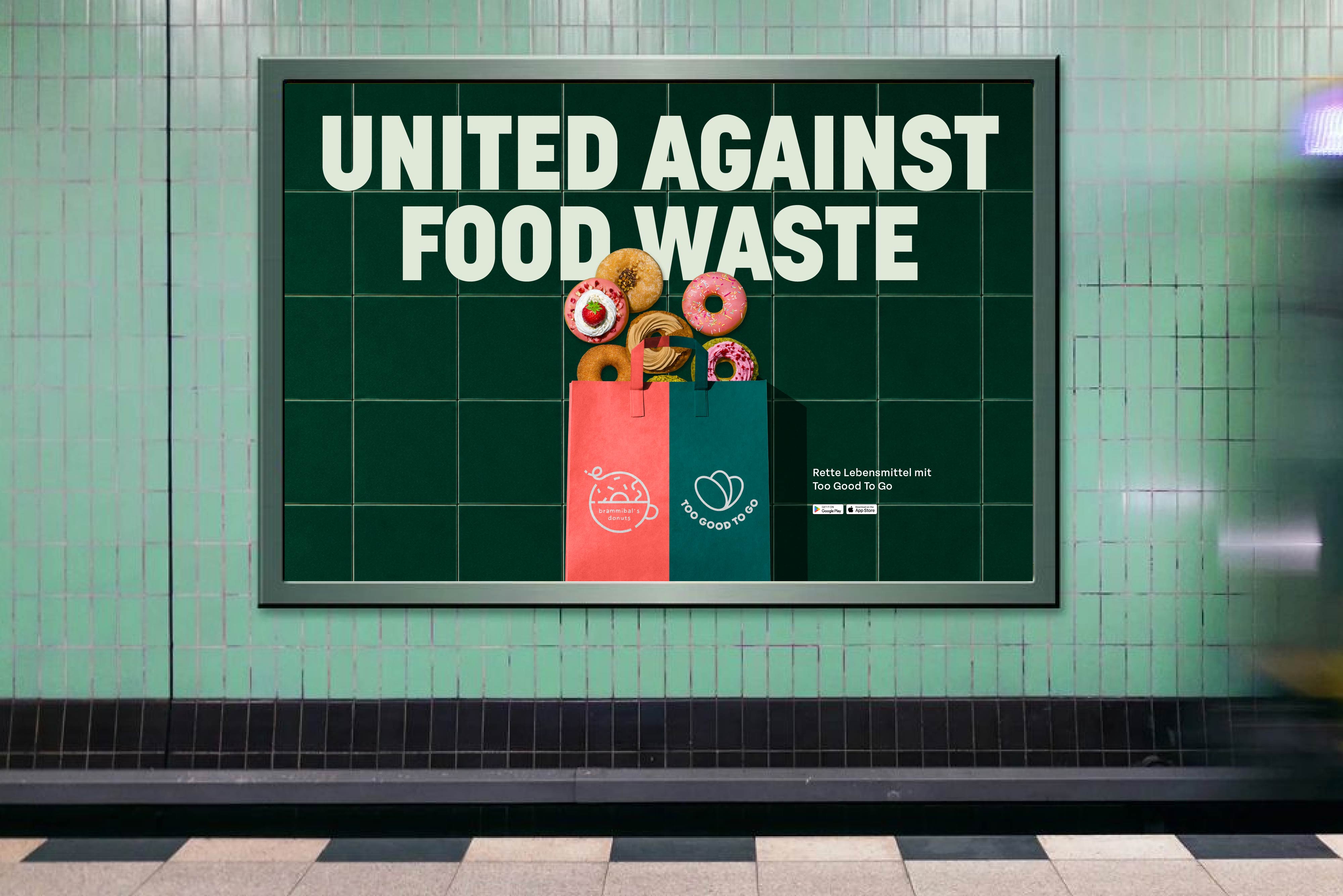 'United Against Food Waste' poster with Brammibal's Donuts on a subway tile wall